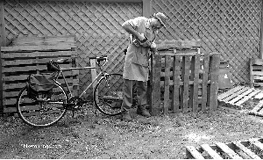 Picture of commuter bike and wood worker