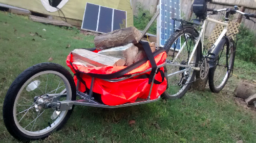 Picture of Aosom single wheel bike trailer and waterproof dry bag.