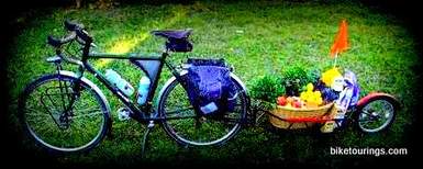 Picture of touring bike and bicycle trailer used for Food Delivery