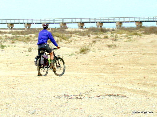 Picture of mountain bike touring on beach
