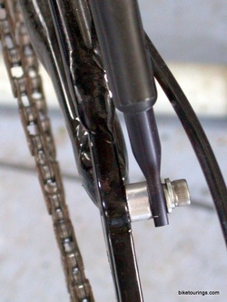 Picture of mountain bike rear rack install disc brake.