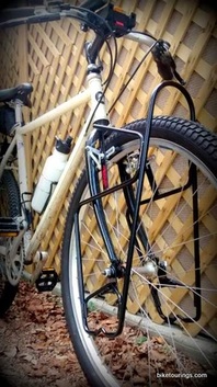 Picture of mountain bike for touring with lowrider style front bike rack for bicycle touring