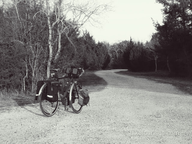 Picture of touring  bike on gravel road with Schwalbe Mondial Tires